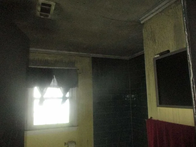 Bathroom before restoration, fire damage