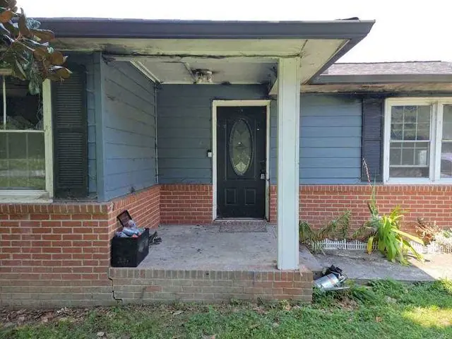 Front porch before restoration, fire damage