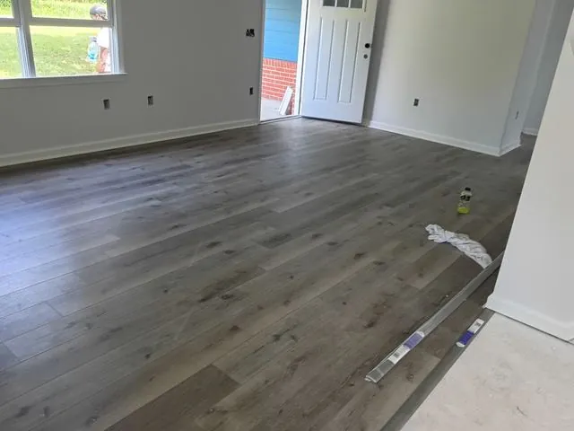 Living room after restoration with new flooring